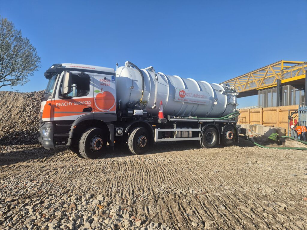 Peachy Services tanker at a site in Hampton, London, for the cleaning of an oil interceptor system
